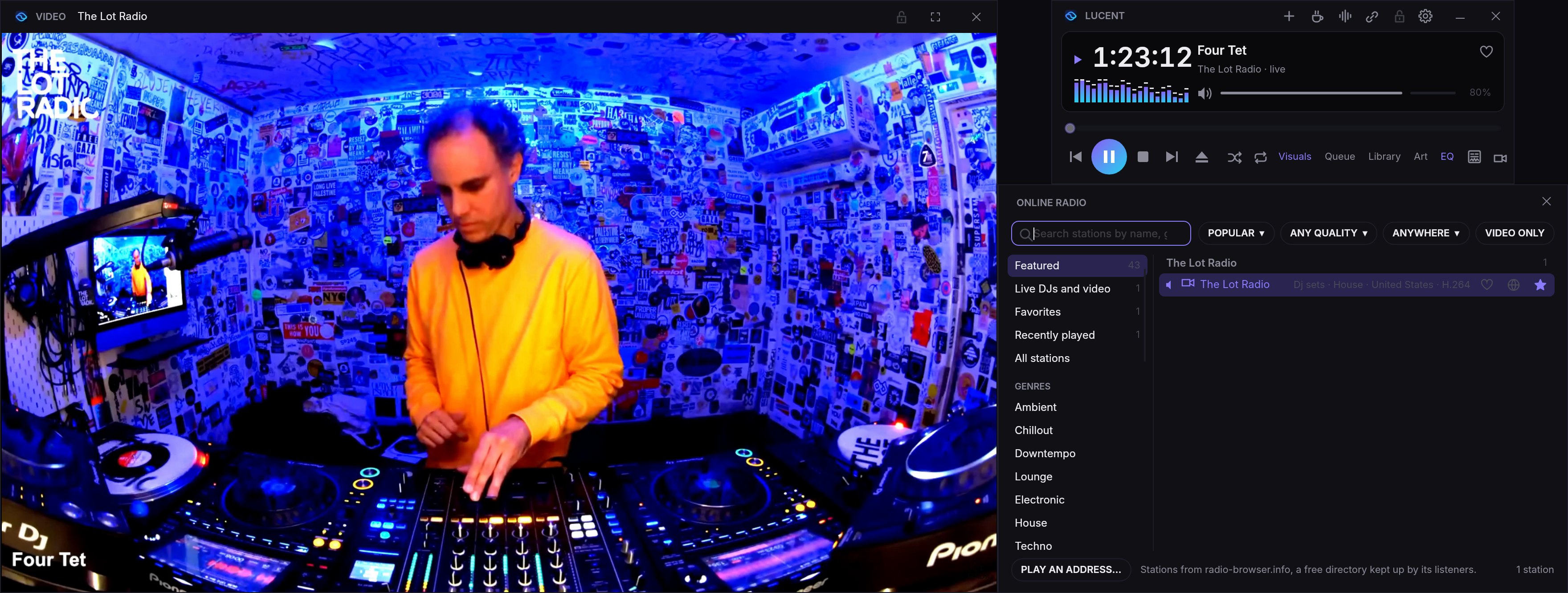 Four Tet's live set on The Lot Radio playing in Lucent: the Video window shows him at the decks in the sticker-covered booth, the player shows Four Tet live on The Lot Radio, and the Online radio window is filtered to video stations